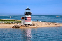 Nantucket Island Lighthouse with American Flag on Quiet Summer D